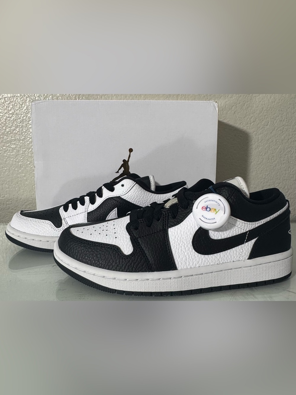Women’s Nike Air Jordan 1 Low SE in White / Black in Size 7.5